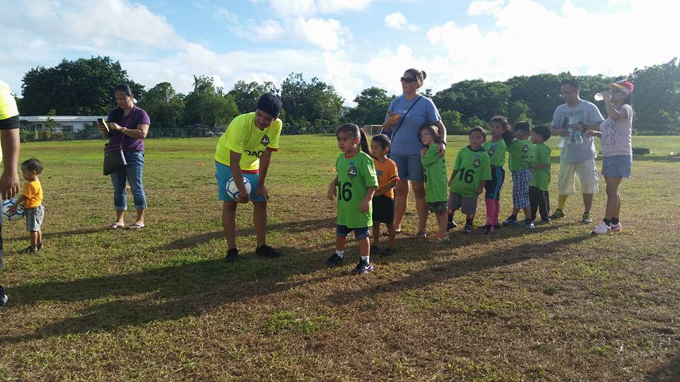 E-Soccer Guam Fall 2016 season junior coach working with players