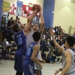 Bulldogs Issac Snively gets hacked on the second chance opportunity. (photo by Robert Balajadia)