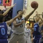 Bulldog Nate Lorenzo converts on the left hand layup in the lane. (photo by Robert Balajadia)