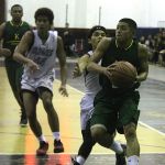Islander Aljurrell Grape attacks the basket on the fast break. (by Robert Balajadia)