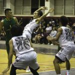 Islander Chris Conner dishes a behind the back pass to a teammate in the corner. (by Robert Balajadia)