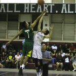 Islanders Chris Conner and Sharks Chris Garcia tip-off the overtime. (by Robert Balajadia)