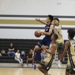 Jiandong Lin (#3) of the Harvest Eagles attempts a flashy layup as he passes by Richard Santos (#4 defending) of the Tiyan Titans. (photo by Raine Delos Reyes)