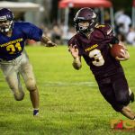 Player of the game Kein Artero blazes down the field for first down. (Photo by Michael Blas)