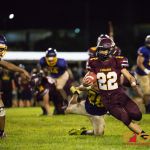 Friar's Caiyle Gogue blazes through Gecko defense. (Photo by Michael Blas)