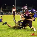 Friar's Kein Artero gets slammed by Gecko defense. (Photo by Michael Blas)