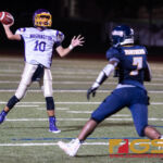 GW Geckos' QB Enrique Macias launches the ball before Guam High Panther's Sincere Powell can get to him. (Photo by Michael Blas)