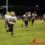 Tiyan Titan's Kio Kaminanga runs into JFK territory during a kick return. (Photo by Michael Blas)