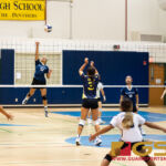 Harvest Christian Academy Eagles Gabrielle Paulin leaps up to spike down onto the Guam High Panthers. (Photo by Michael Blas)