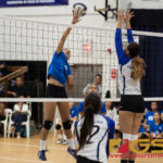 Player of the Game Ella Balajadia spikes past St. Paul Christian Warrior's Monica Giger. (Photo by Michael Blas)