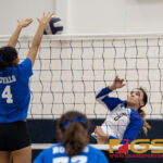 Norte Dame Royal's Ella Balajadia denies a shot from St. Paul Christian Warrior's Monica Giger. (Photo by Michael Blas)