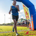 Guam High Panthers Tanea Henderson finishes in second place with a time of 22:16.64. (Photo by Michael Blas)