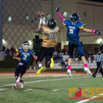 JFK Islanders Juan Sarmiento and Guam High Panthers Jalen Thach jumps up high in attempt to make a reception. (Photo by Michael Blas)