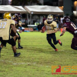 Tiyan Titans Kio Kaminanga gains yardage after a kick off from the Father Duenas Friars. (Photo by Michael Blas)