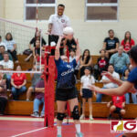 AOLG Cougars Cassidy Tobiason sets the ball for her teammates to capitalize. (Photo by Michael Blas)