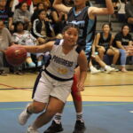 Panther Aniah Cruz gets into the paint before flipping up a reverse shot for two early points. (photo by Robert Balajadia)