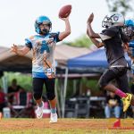 Angels Alex Sojo looks down field and passes to an open receiver. (Photo by Michael Blas)