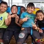 Angels Manha division players strike a pose after watching their Metgot Division win the championship. (Photo by Michael Blas)