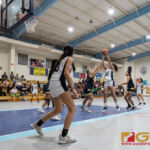 Academy Cougars Therese Fegurgur takes a two pointer with Guam High Panthers Aniah Cruz contesting. (Photo by Michael Blas)
