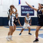 St. Paul Warriors Isla Quinata takes an open two pointer to increase the Warriors lead early in the first quarter. (Photo by Michael Blas)