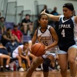 Gw Geckos Alana Salas drives towards the net while St. Paul Warriors Tiffani Lopez looks for the stop.(Photo by Michael Blas)