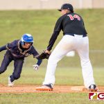 Guam High Panthers Ruben Ramirez gets back before getting tagged out. (Photo by Michael Blas)