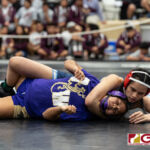 Academy Cougars Lauren Lujan defeated GW Geckos Aveah Garrido to get gold in the 122 pound division. (Photo by Michael Blas)