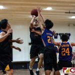 FD Friars Colin Santiago takes a shot in the paint will be faced by GW Geckos Josh Sebastian. (Photo by Michael Blas)