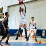 Guam High Panthers Corey Brown takes an open shot to continue the Panthers lead in the first half of the game. (Photo by Michael Blas)