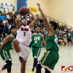 Okkodo Bulldogs Jon Michael Lorena leaps up for a shot after bringing in the rebound. (Photo by Michael Blas)