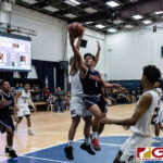 Okkodo Bulldogs Dale Bautista finds room through the Warrior defense and attacks the basket. (Photo by Michael Blas)