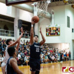 St. Paul Warriors Ilac Lalic bounces up from under the rim to knock in two points. (Photo by Michael Blas)
