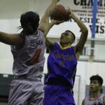 GW's Ron Shimizu rises up for a jumper in the lane against Shark Harold Gaerlan. (photo by Robert Balajadia)
