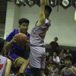 GW Gecko Edmund Palacios gets to the free throw line in overtime where he would sink two free throws. (photo by Robert Balajadia)
