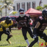 Vandrew Naputi carries the ball looking for an opening from the defense. (photo by Bout It Productions)