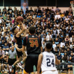 FD Friars Isaiah Pelkey flies towards the rim, adding to the Friars lead in the second quarter. (Photo by Michael Blas)