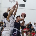 Bulldog Dale Bautista drives baseline for a difficult shot attempt. (photo by Robert Balajadia)