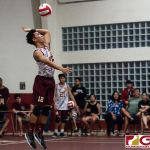 FD Friars Camden Camacho on the serve midway in the second set. (Photo by Michael Blas)