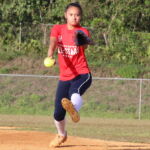 Cougar Ashley Mendiola finished her final high school performance with eight total strikeouts. Sanchez Shark Ginae Joseph tries to tag a sliding runner for an out. (photo by Robert Balajadia)