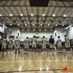 Team Elite & Team Supreme stand in line before the start of the 2019 Wendy's All-Star Basketball Game. (photo by Bout It Productions)