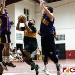 Gecko defenders surround Elite Friars Dominic Sablan as he takes a shot in the paint. (Photo by Michael Blas)