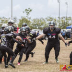 The Sindalu Raiders and SB Saints hit the gridiron in the opening week of the 2019 GWFTL Season. (photo by Bout It Productions)