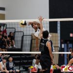 Harvest Eagles Alan Thomas gets the kill past Titans Trevor Martinez. (Photo by Michael Blas)