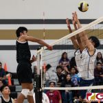 Tiyan Titans Neil Ericsson spikes through Eagles Michael Choi. (Photo by Michael Blas)