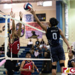 St. Paul Warriors Jonathan Sevilla tips the ball past Okkodo Bulldogs Nash Espino. (Photo by Michael Blas)