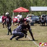 Team Legacy Paige Surber gets taken down by Island Stunnerz Sonja White. (photo by Bout It Productions)