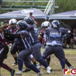 Island Stunnerz Cindy Champaco goes for the tackle against Team Legacy. (photo by Bout It Productions)
