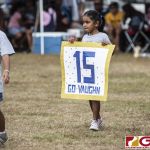 An Island Stunnerz fan holds a sign in support of #15 Dani Vaughn. (photo by Bout It Productions)