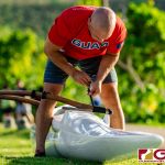 Guam Men's Va'a Team Member John Aguon prepares his boat for training. (Photo by Michael Blas)