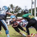Hal's Angels Noah Medler slips on the run towards the end zone. (photo by Bout It Productions)